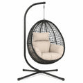 Fauteuil suspendu Tornavik en acier et résine tressée noir et beige avec support, dimensions 100x100x195 cm.