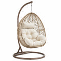 Fauteuil suspendu en rotin beige avec support en métal brun, style bohème, dimensions 105x105x195 cm, par Tornavik.